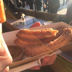 A photo of three Sugar and Cinnamon Churros with Salted Caramel Dip ready to eat