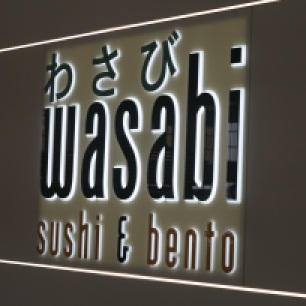 A photograph of the Wasabi signage. Photograph courtesy of Alice Toby-Brant of http://www.themiddlesister.co.uk/