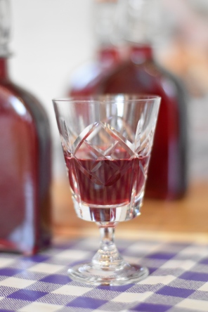 A photo of a small cut glass of the blackberry vodka