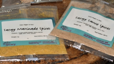 A close up photograph of the satay marinade spices and satay sauce spices