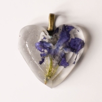 A photograph of the finished periwinkle pendant