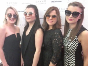 A team photograph in Taank Optometrists. The girls are wearing designer sunglasses