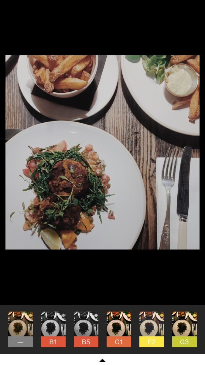 A screenshot of VSCO filter options and a photograph of Emma's meal at the Old Bicycle Shop in Cambridge