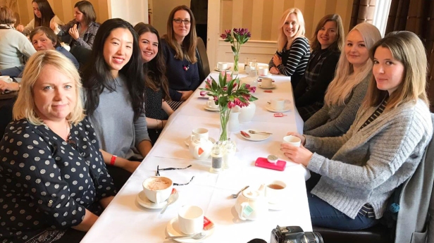 A photograph of the bloggers enjoying tea and cake at The Almonry