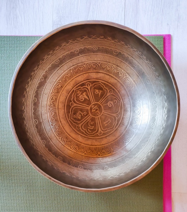 A view from above a Tibetan singing bowl. Even the inside is intricately decorated