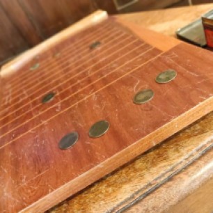A wooden shove ha'penny board