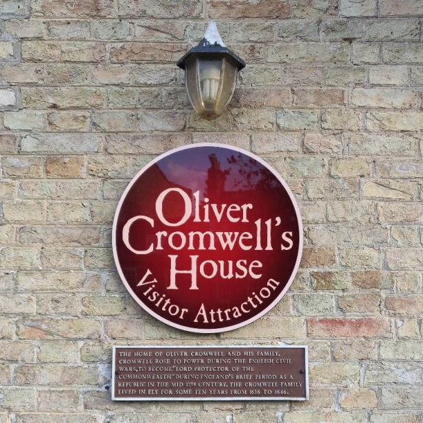 Oliver Cromwell's House sign on the wall outside